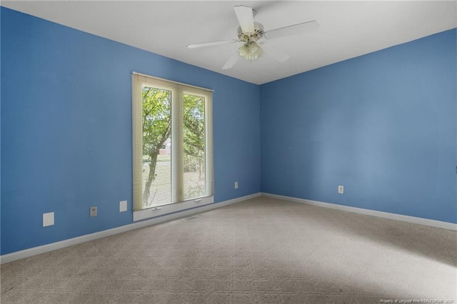 116 Bledsoe St, Hope Mills, NC 28348 - carpeted spare room featuring baseboards and a ceiling fan