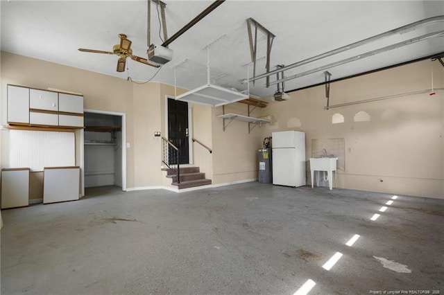 116 Bledsoe St, Hope Mills, NC 28348 - garage featuring freestanding refrigerator, electric water heater, a garage door opener, and a ceiling fan