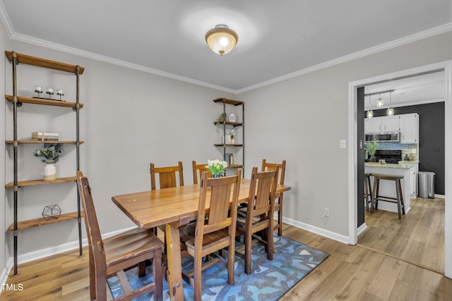 350 Amherst Creek Dr, Wake Forest, NC 27587 - dining room featuring ornamental molding and light wood-type flooring