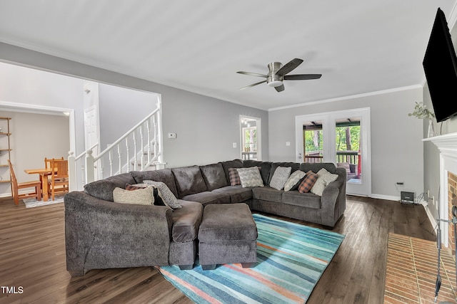 350 Amherst Creek Dr, Wake Forest, NC 27587 - living area featuring wood finished floors, stairs, a ceiling fan, ornamental molding, and a fireplace