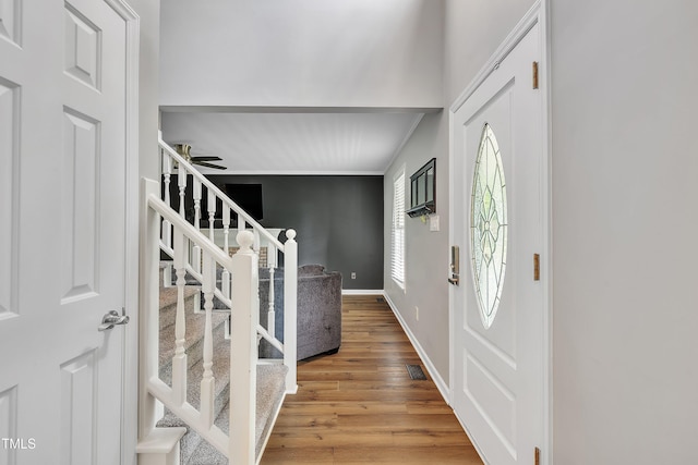 350 Amherst Creek Dr, Wake Forest, NC 27587 - entrance foyer featuring stairs and light wood finished floors