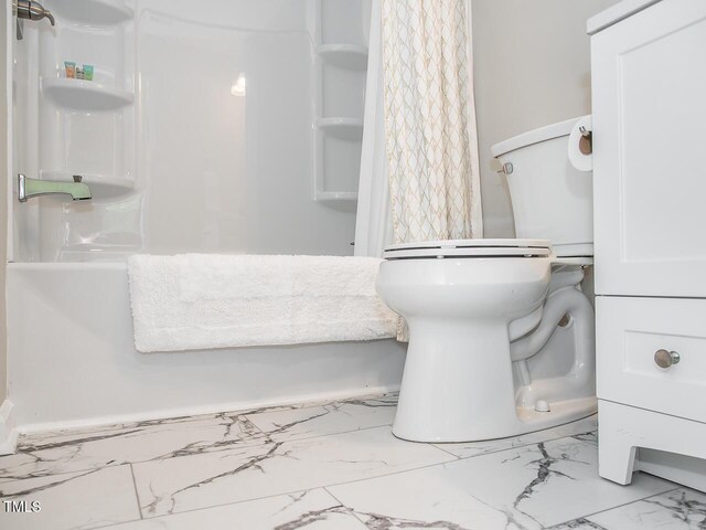 3009 Omah St, Durham, NC 27705 - full bathroom with marble finish floors and a shower