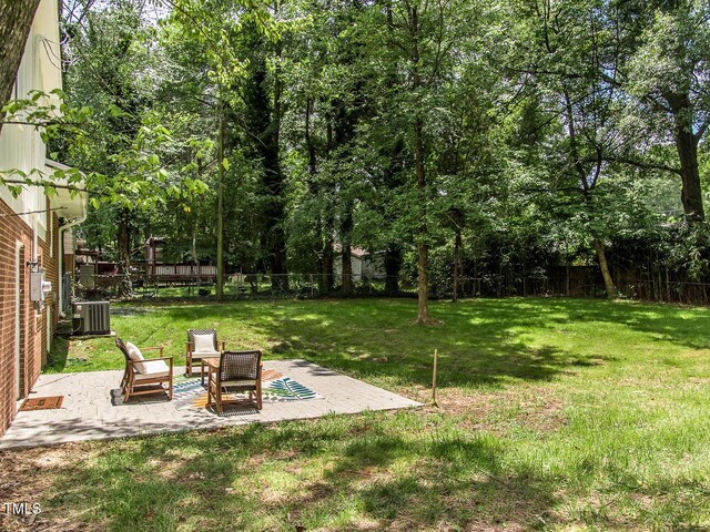 3009 Omah St, Durham, NC 27705 - fenced backyard featuring a patio