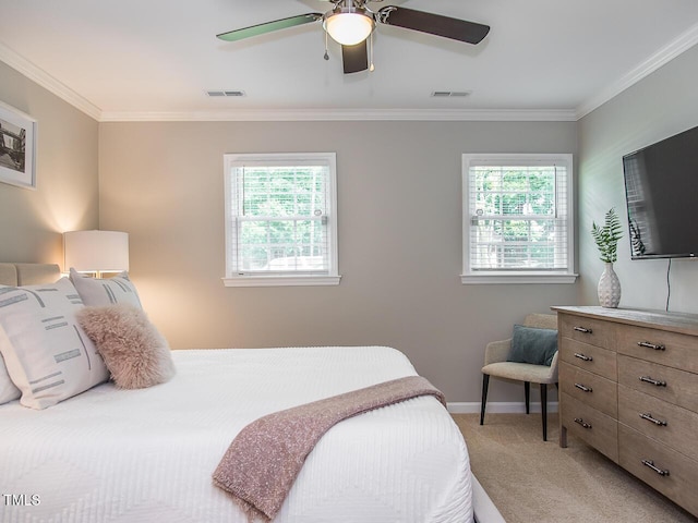 3009 Omah St, Durham, NC 27705 - bedroom with light colored carpet, crown molding, and a ceiling fan
