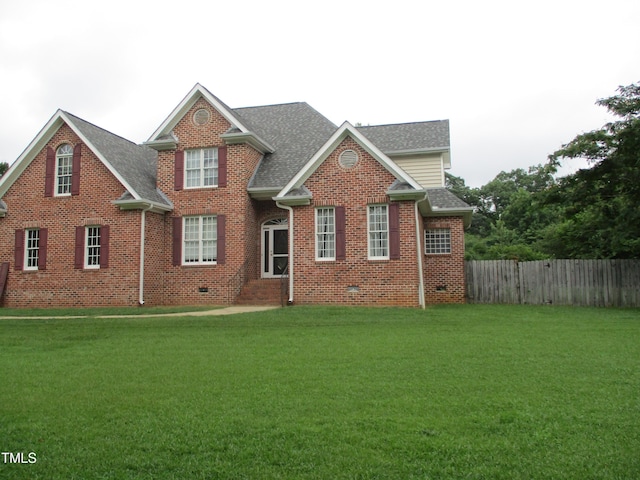 4817 Tupenny Ln, Raleigh, NC 27606 - traditional-style house with brick siding, roof with shingles, entry steps, and crawl space
