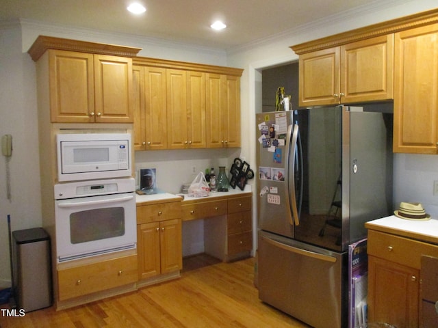 4817 Tupenny Ln, Raleigh, NC 27606 - kitchen featuring white appliances, ornamental molding, light wood-type flooring, recessed lighting, and light countertops