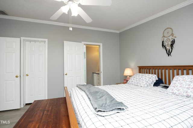 205 N Raleigh Farms Rd, Youngsville, NC 27596 - bedroom with ornamental molding, wood finished floors, and a ceiling fan