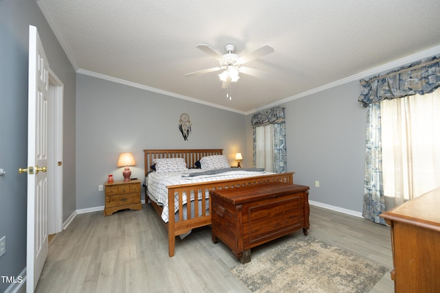 205 N Raleigh Farms Rd, Youngsville, NC 27596 - bedroom with light wood-style floors, crown molding, and a ceiling fan
