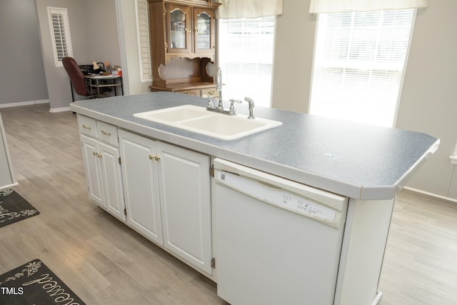 205 N Raleigh Farms Rd, Youngsville, NC 27596 - kitchen featuring dishwasher, light wood-style floors, and white cabinets