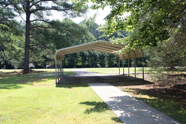 205 N Raleigh Farms Rd, Youngsville, NC 27596 - surrounding community featuring a carport and a lawn