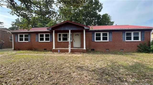1034CRAYTONCIRCLE Crayton Cir, Fayetteville, NC 28314 - ranch-style house featuring crawl space, a metal roof, a front lawn, and brick siding