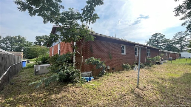 1034CRAYTONCIRCLE Crayton Cir, Fayetteville, NC 28314 - view of home's exterior featuring brick siding and crawl space