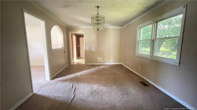 1034CRAYTONCIRCLE Crayton Cir, Fayetteville, NC 28314 - unfurnished dining area featuring carpet, a chandelier, and crown molding
