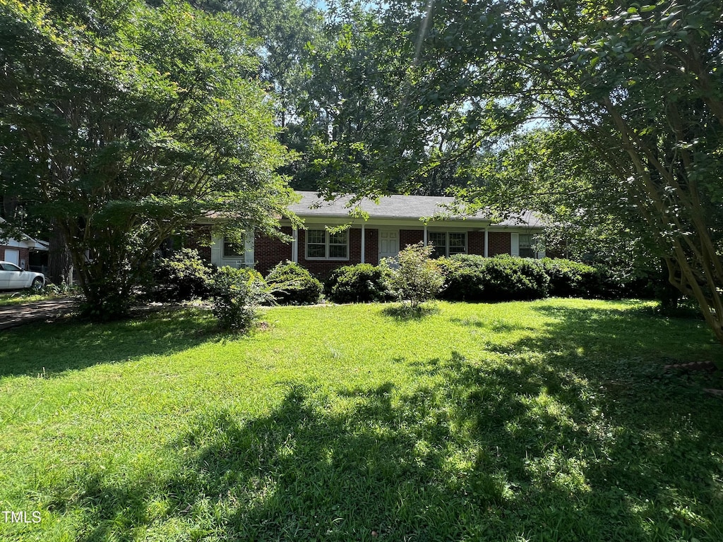 155 Dorsey Pl, Henderson, NC 27536 - view of front of home featuring a front lawn and brick siding