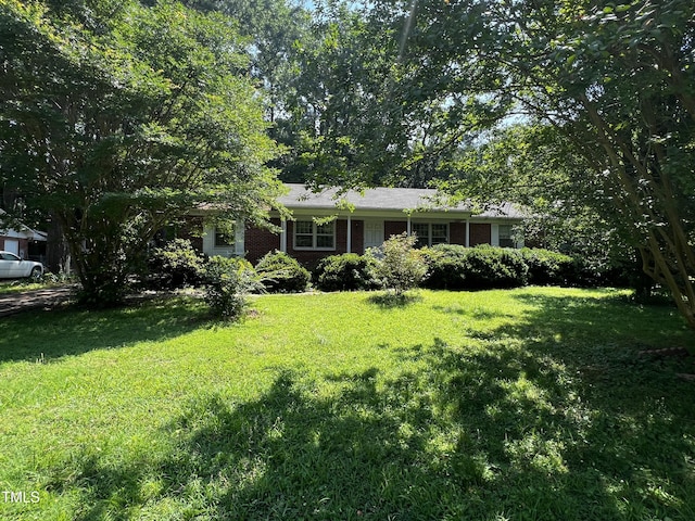 155 Dorsey Pl, Henderson, NC 27536 - view of front of home featuring a front lawn and brick siding