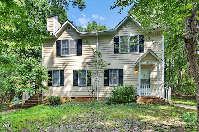10 Tarawa Ter, Durham, NC 27705 - view of front of house featuring a chimney and a front yard