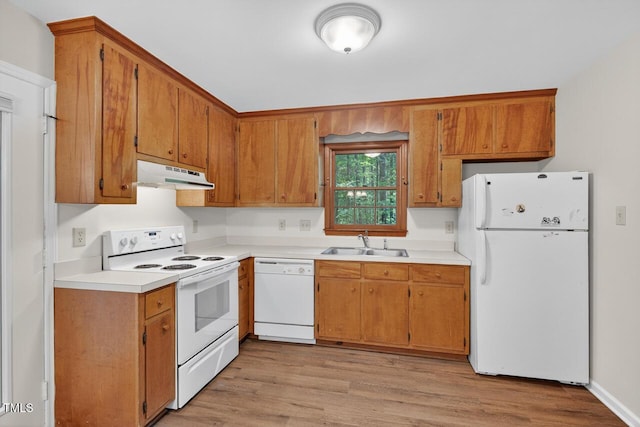 10 Tarawa Ter, Durham, NC 27705 - kitchen featuring white appliances, under cabinet range hood, light countertops, and light wood-style floors