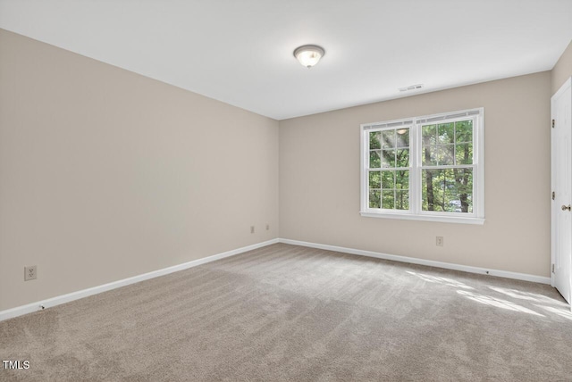 10 Tarawa Ter, Durham, NC 27705 - carpeted empty room with baseboards