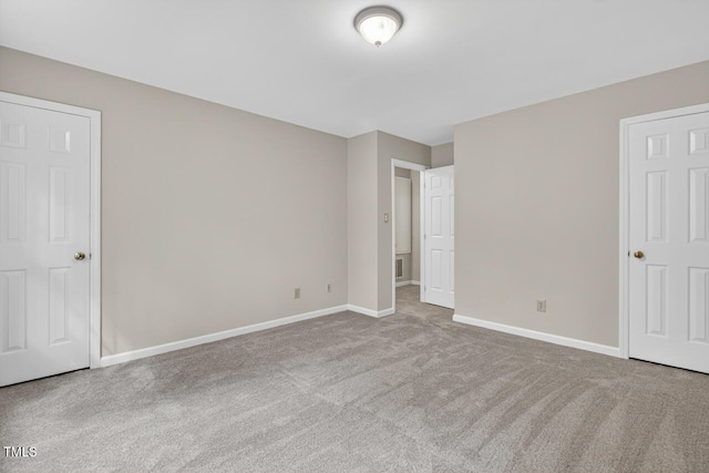 10 Tarawa Ter, Durham, NC 27705 - unfurnished bedroom with carpet and baseboards