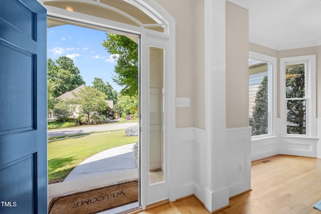 202 Bridewell Ct, Cary, NC 27518 - foyer entrance with light wood-style flooring and ornamental molding