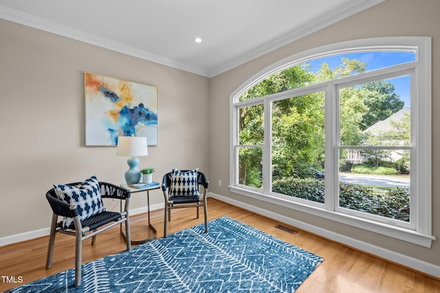 202 Bridewell Ct, Cary, NC 27518 - sitting room with ornamental molding, wood finished floors, and recessed lighting