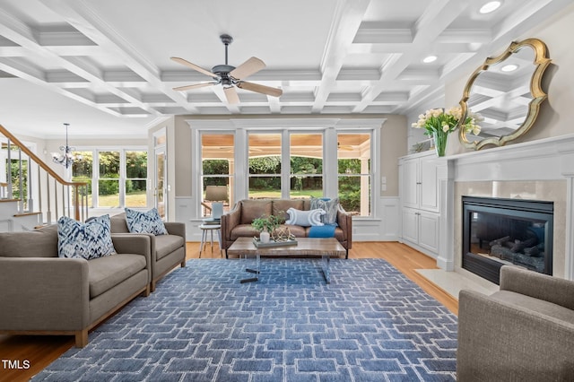 202 Bridewell Ct, Cary, NC 27518 - living room featuring coffered ceiling, light wood finished floors, ornamental molding, ceiling fan, and beam ceiling