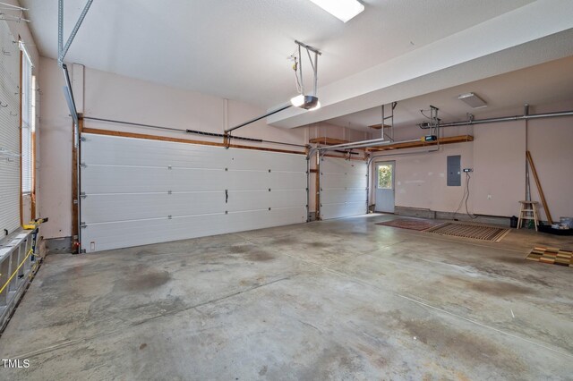202 Bridewell Ct, Cary, NC 27518 - garage featuring electric panel and a garage door opener