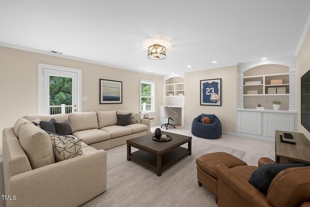 202 Bridewell Ct, Cary, NC 27518 - living area with crown molding, built in shelves, recessed lighting, and light colored carpet