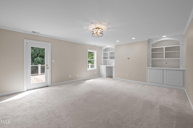 202 Bridewell Ct, Cary, NC 27518 - spare room featuring crown molding, healthy amount of natural light, built in shelves, light colored carpet, and recessed lighting