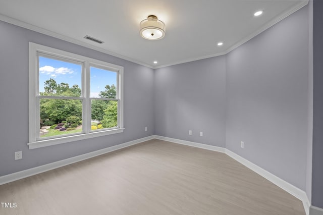 202 Bridewell Ct, Cary, NC 27518 - spare room with crown molding, light wood-style floors, and recessed lighting