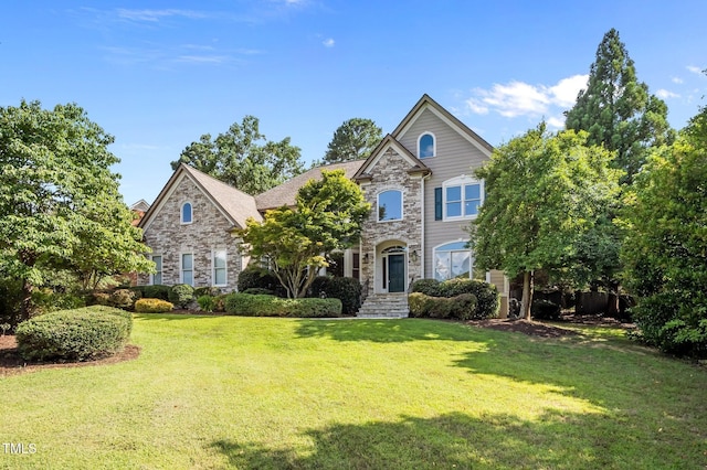 202 Bridewell Ct, Cary, NC 27518 - traditional-style house with stone siding and a front yard