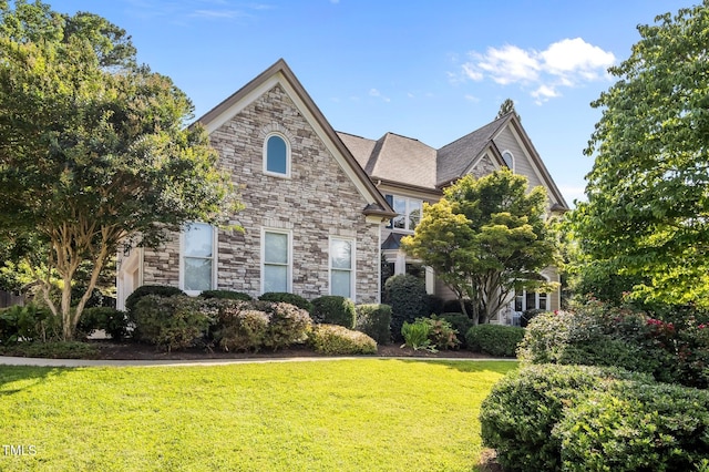 202 Bridewell Ct, Cary, NC 27518 - view of front facade featuring stone siding and a front yard