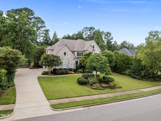 202 Bridewell Ct, Cary, NC 27518 - view of front of property with stone siding, driveway, and a front yard