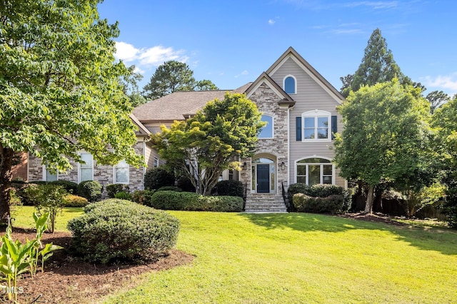 202 Bridewell Ct, Cary, NC 27518 - view of front facade featuring stone siding and a front yard