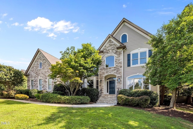 202 Bridewell Ct, Cary, NC 27518 - view of front of home with stone siding and a front yard