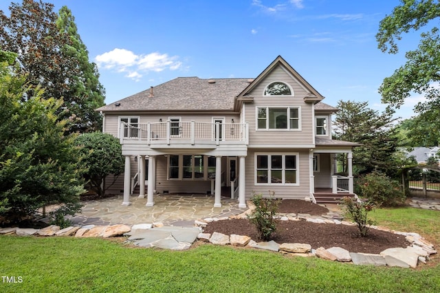 202 Bridewell Ct, Cary, NC 27518 - rear view of property featuring roof with shingles, a balcony, and a patio area