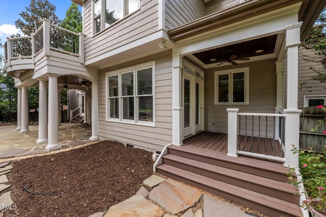 202 Bridewell Ct, Cary, NC 27518 - view of exterior entry featuring ceiling fan, a balcony, and a patio area