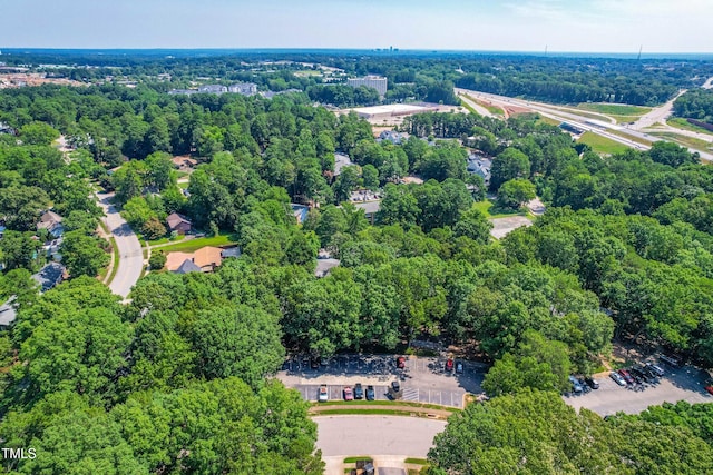 1212 Schaub Dr, Raleigh, NC 27606 - aerial view of a heavily wooded area