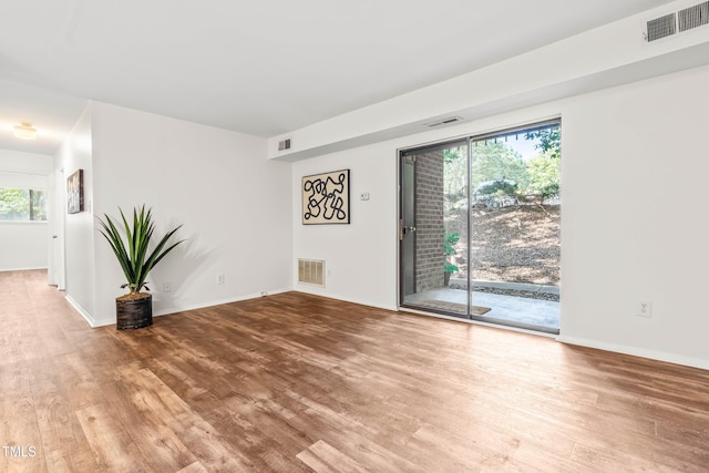 1212 Schaub Dr, Raleigh, NC 27606 - unfurnished room featuring wood finished floors and baseboards