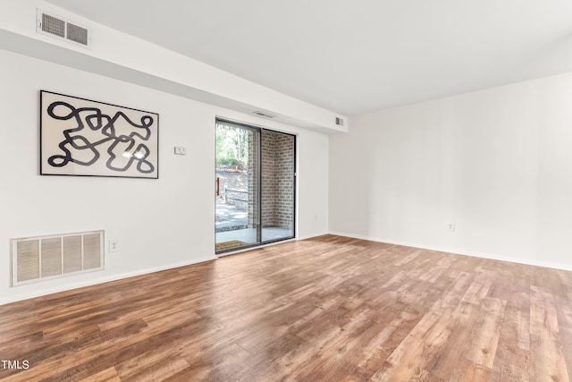 1212 Schaub Dr, Raleigh, NC 27606 - spare room featuring wood finished floors and baseboards
