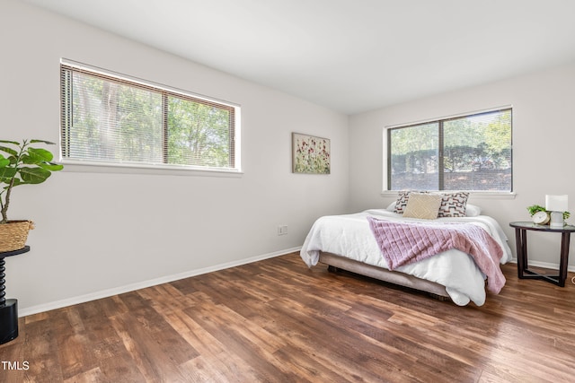 1212 Schaub Dr, Raleigh, NC 27606 - bedroom with wood finished floors