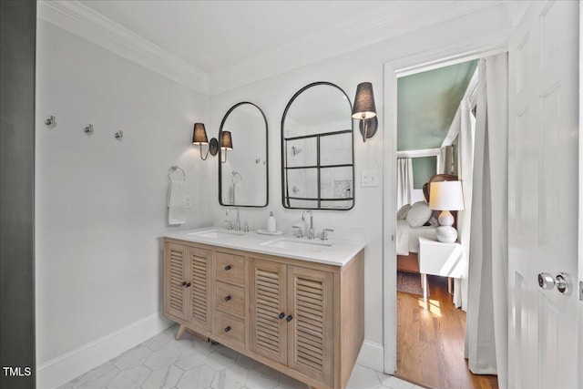 8909 Hunting Trl, Raleigh, NC 27613 - bathroom with crown molding, double vanity, connected bathroom, and tile patterned flooring