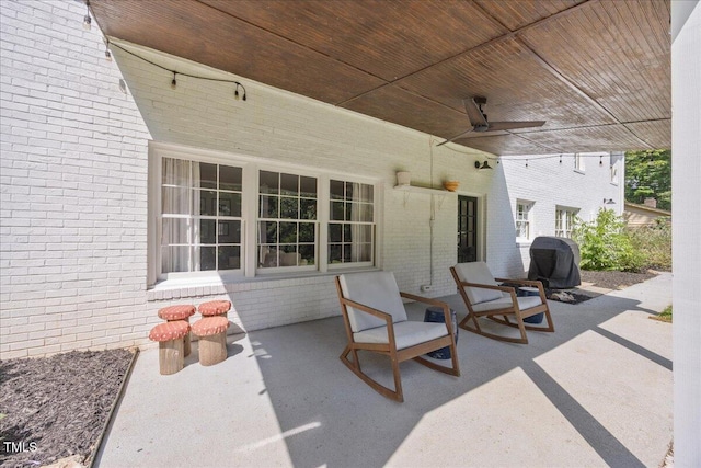 8909 Hunting Trl, Raleigh, NC 27613 - view of patio featuring ceiling fan and grilling area