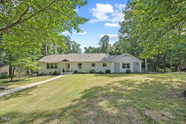 8909 Hunting Trl, Raleigh, NC 27613 - ranch-style house with a front lawn