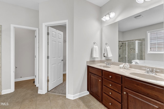 3905 Song Sparrow Dr, Wake Forest, NC 27587 - full bath featuring a shower stall, double vanity, tile patterned flooring, and a bath