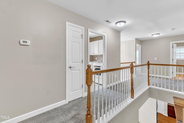 3905 Song Sparrow Dr, Wake Forest, NC 27587 - hall with an upstairs landing and carpet