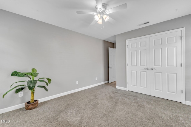 3905 Song Sparrow Dr, Wake Forest, NC 27587 - unfurnished bedroom with carpet flooring, a closet, and a ceiling fan