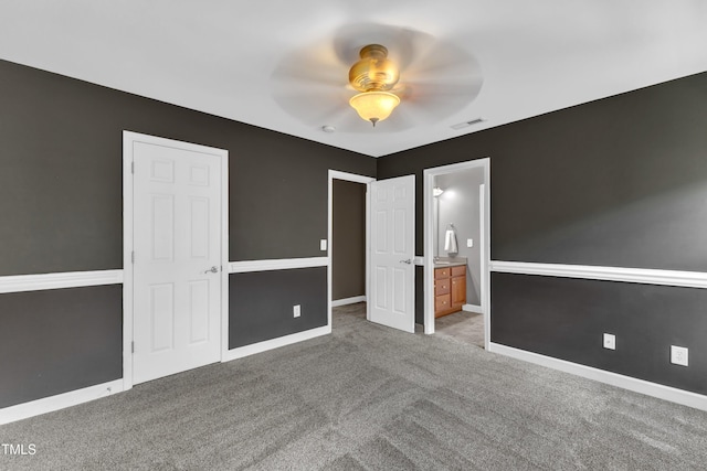 3905 Song Sparrow Dr, Wake Forest, NC 27587 - unfurnished bedroom featuring carpet flooring, connected bathroom, and ceiling fan