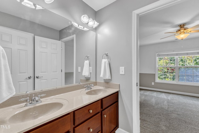 3905 Song Sparrow Dr, Wake Forest, NC 27587 - bathroom featuring double vanity and a ceiling fan