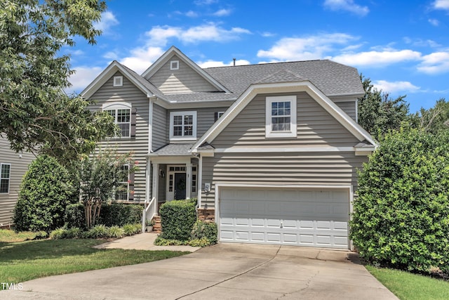 3905 Song Sparrow Dr, Wake Forest, NC 27587 - view of front of home featuring driveway, roof with shingles, and a front yard